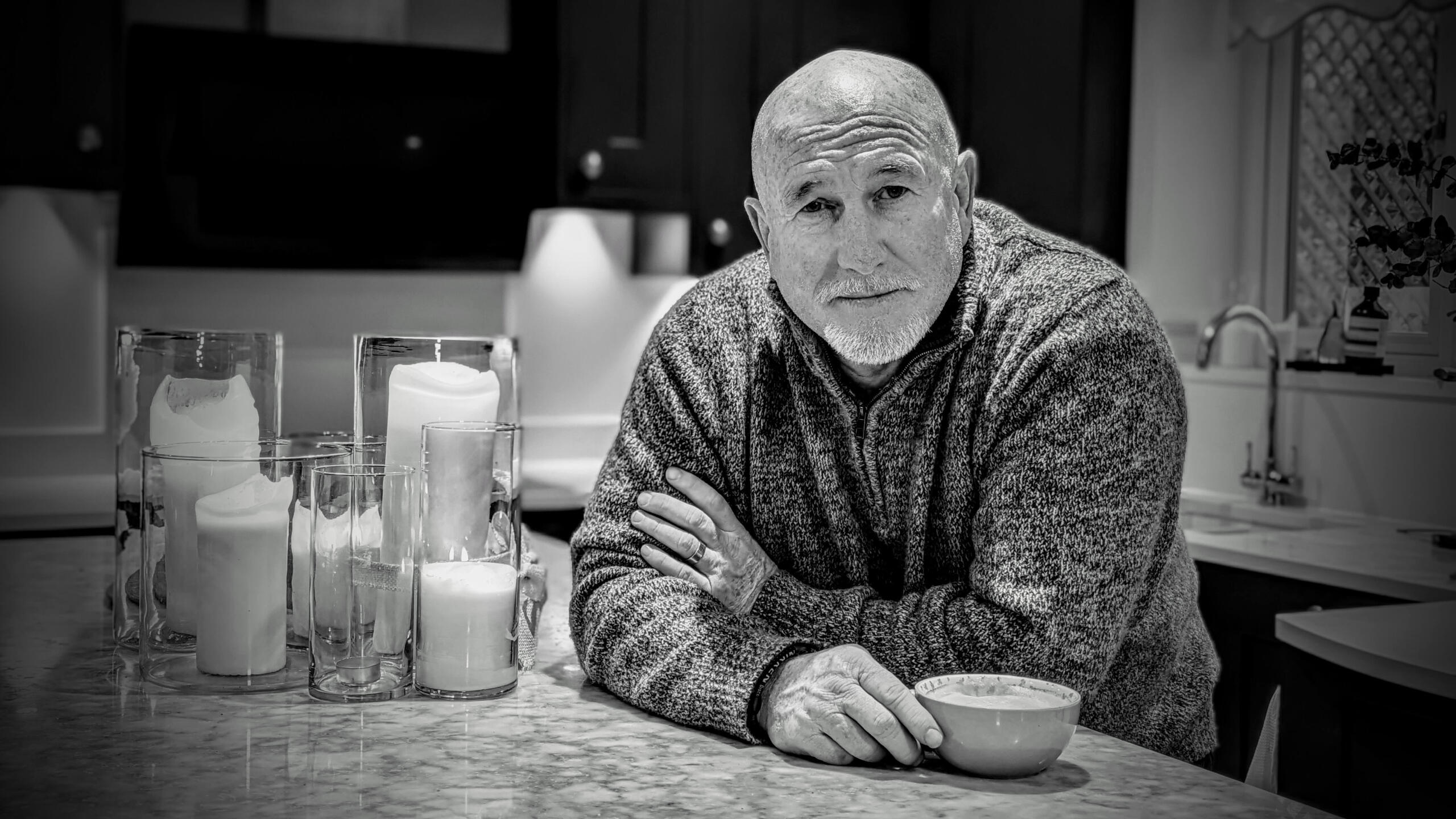 Meditation Teacher and Reiki Master Keith A picture of Meditation Teacher and Reiki Master Keith, in his kitchen with a coffee in his hand